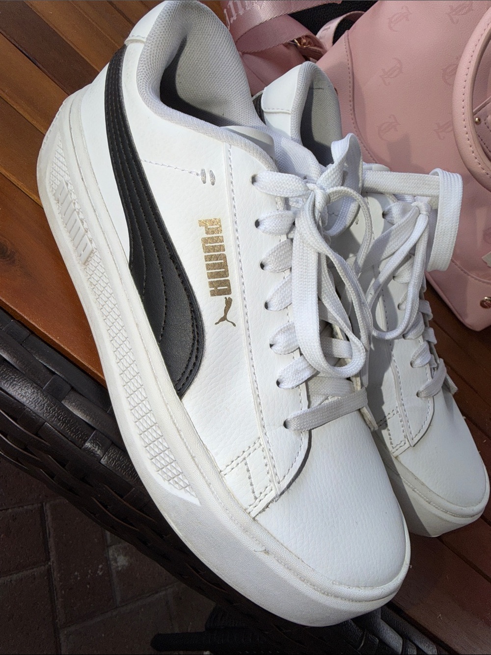 Puma White Sneakers with Black Stripe and Gold Logo